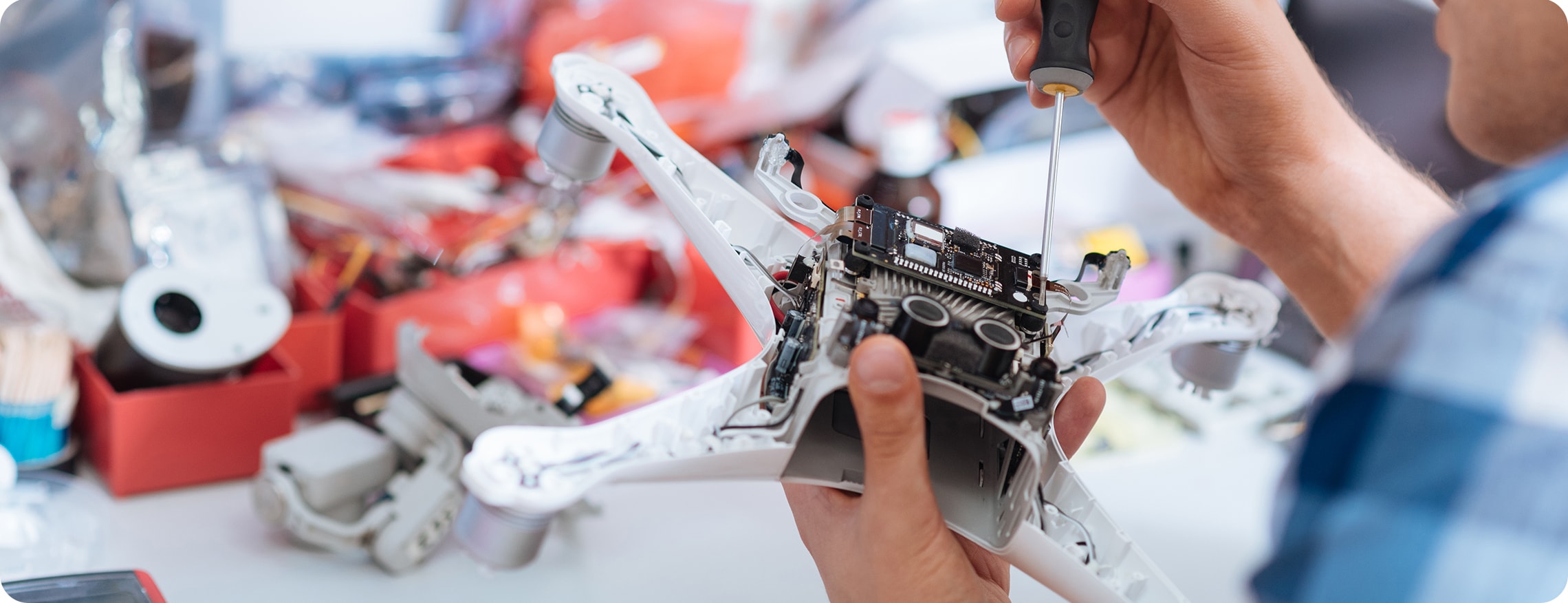 close-up of repair tech fixing drone